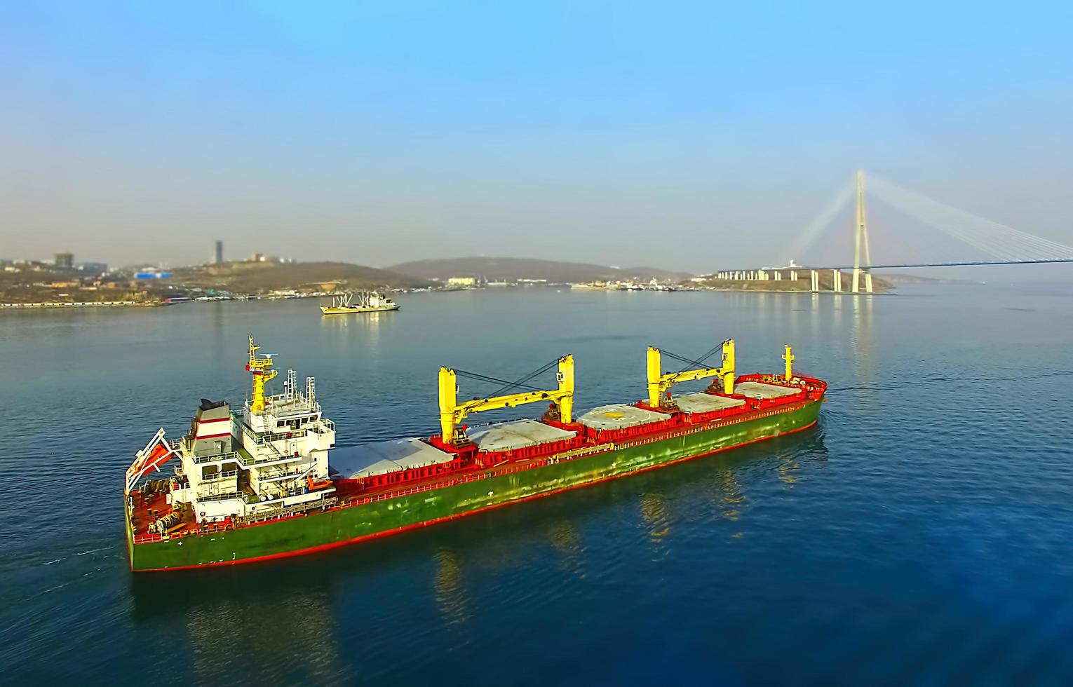 ships on the background of the Russian bridge. photo