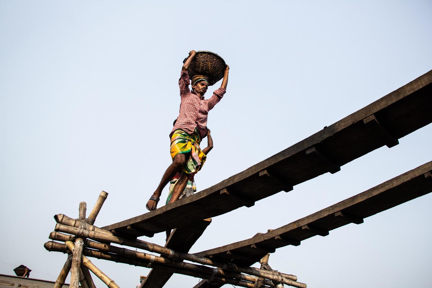 Amen Bazar, Dhaka, Bangladesh, 2021 - People working hard photo