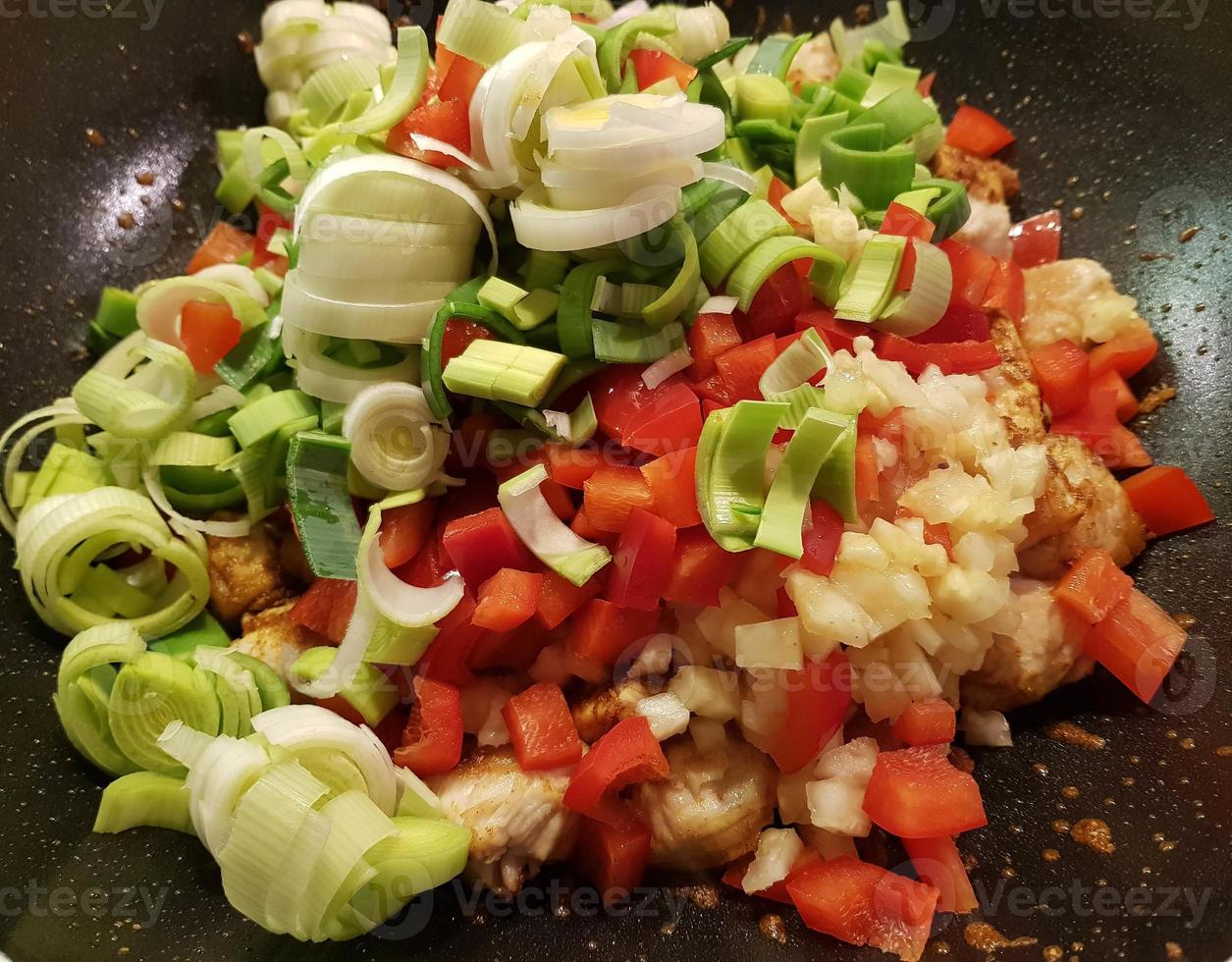 spicy chicken curry with vegetables photo