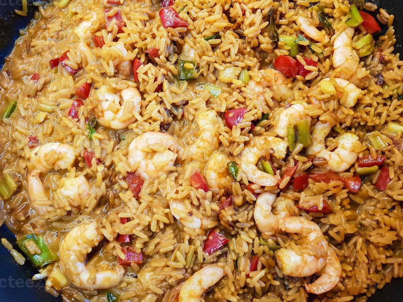 shrimps and spicy vegetables with curry rice photo