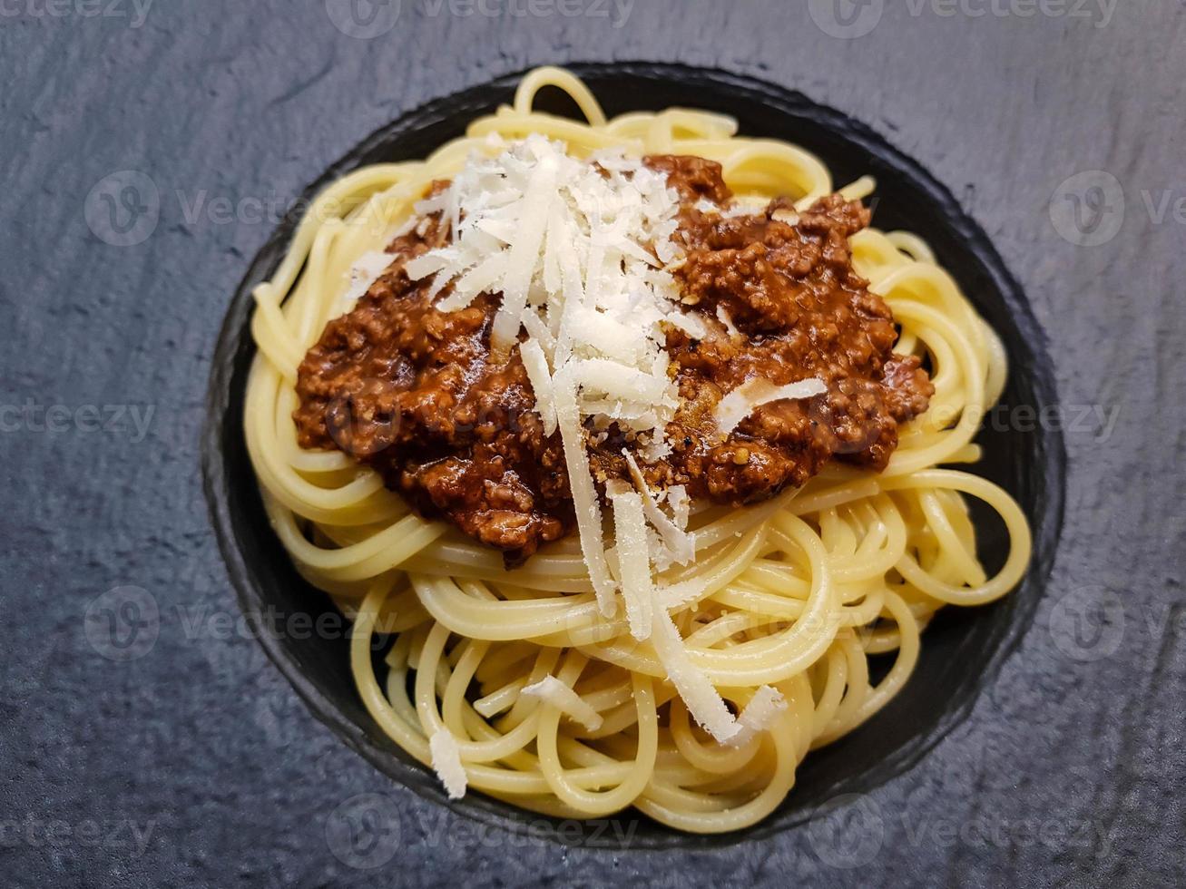 Spaghetti Bolognese with tomato sauce photo