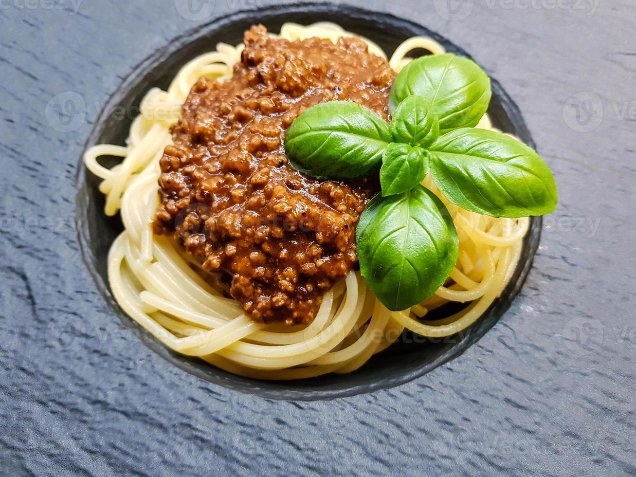 Spaghetti Bolognese with tomato sauce photo