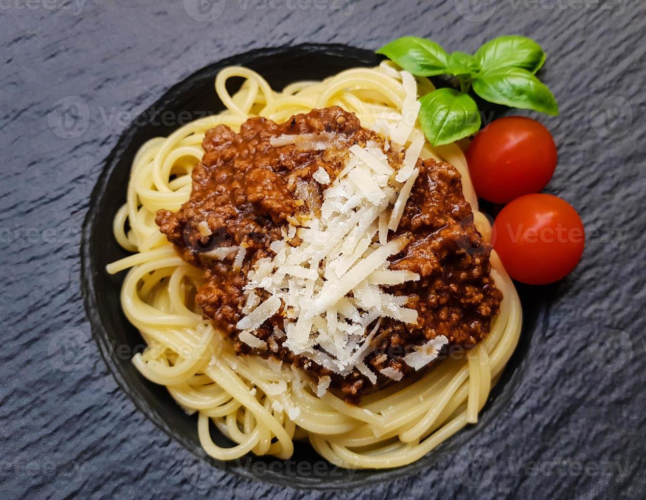 Spaghetti Bolognese with tomato sauce photo