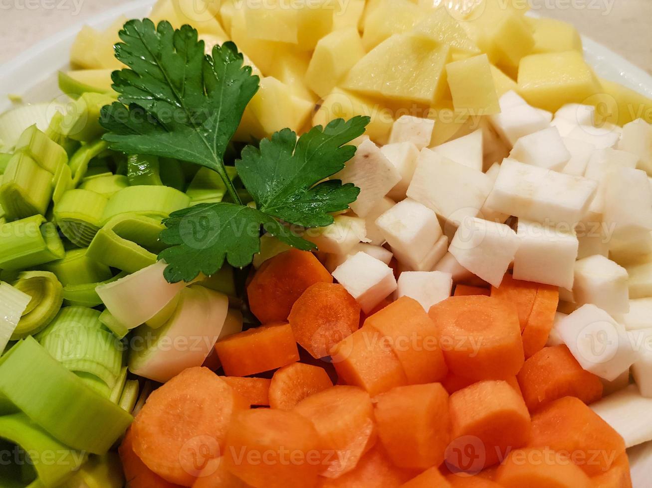 Potato soup with italian cabanossi sausages photo