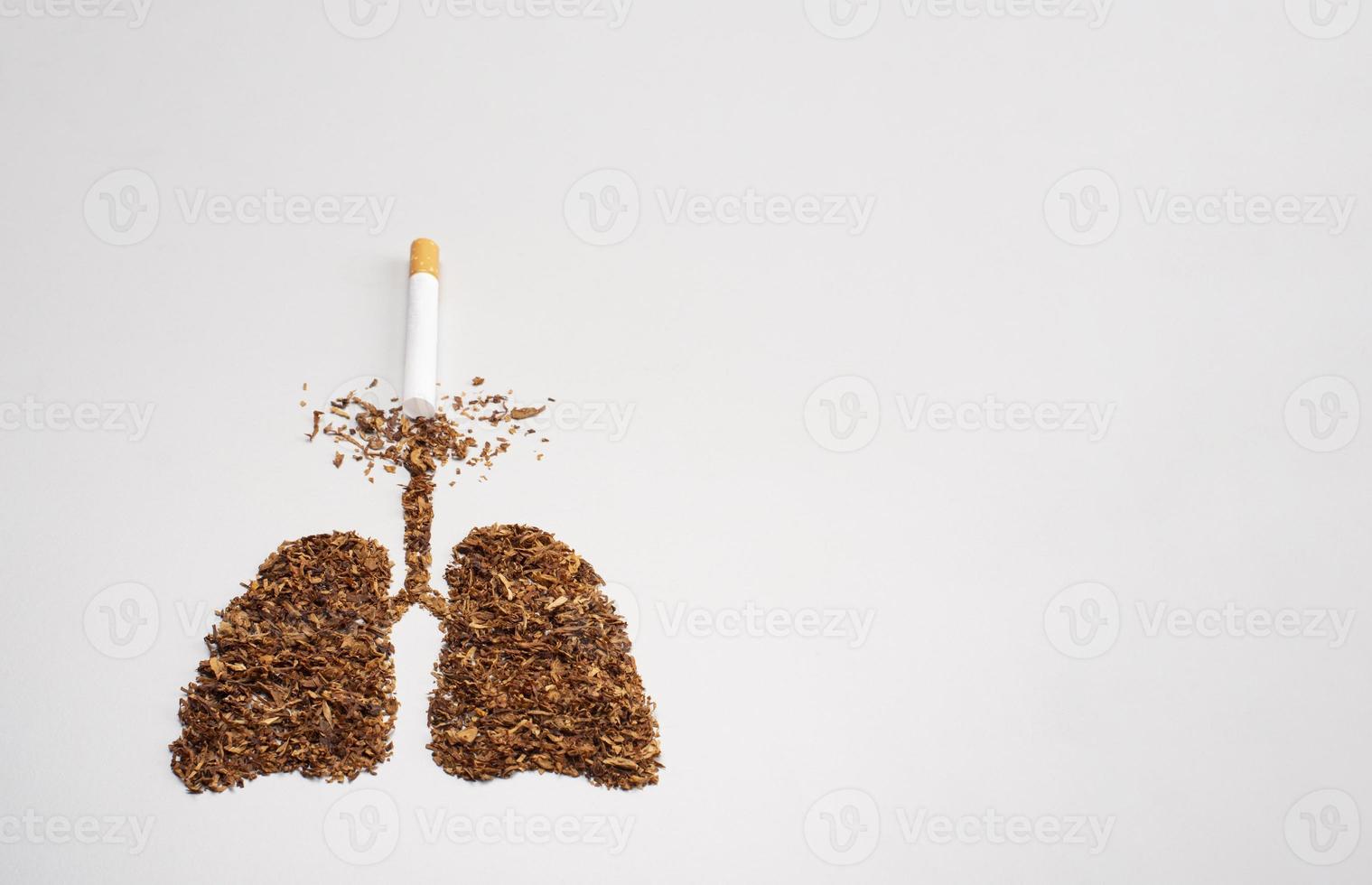 No smoking concept with cigarettes and tobacco lunges shape photo