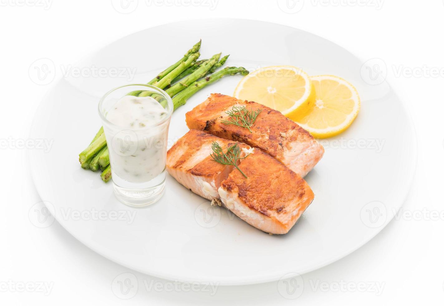 Grilled salmon steak on the table photo