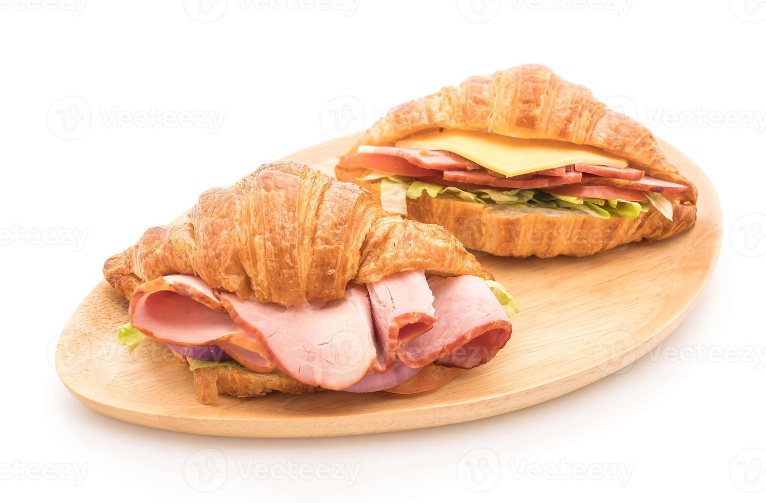 Croissant sandwich ham on white background photo