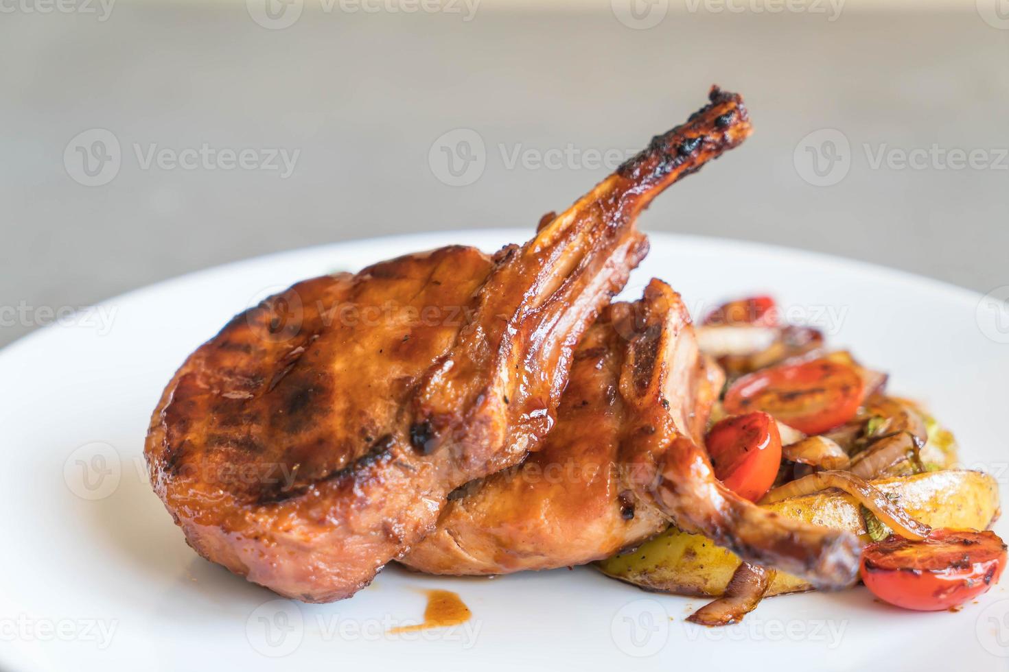 Pork chop steak on the table photo