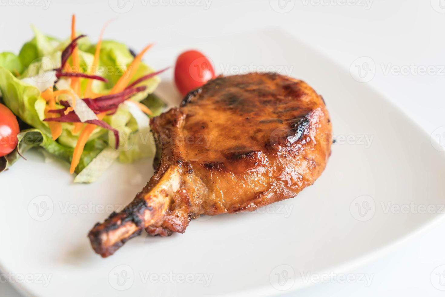 Pork chop steak on the table photo