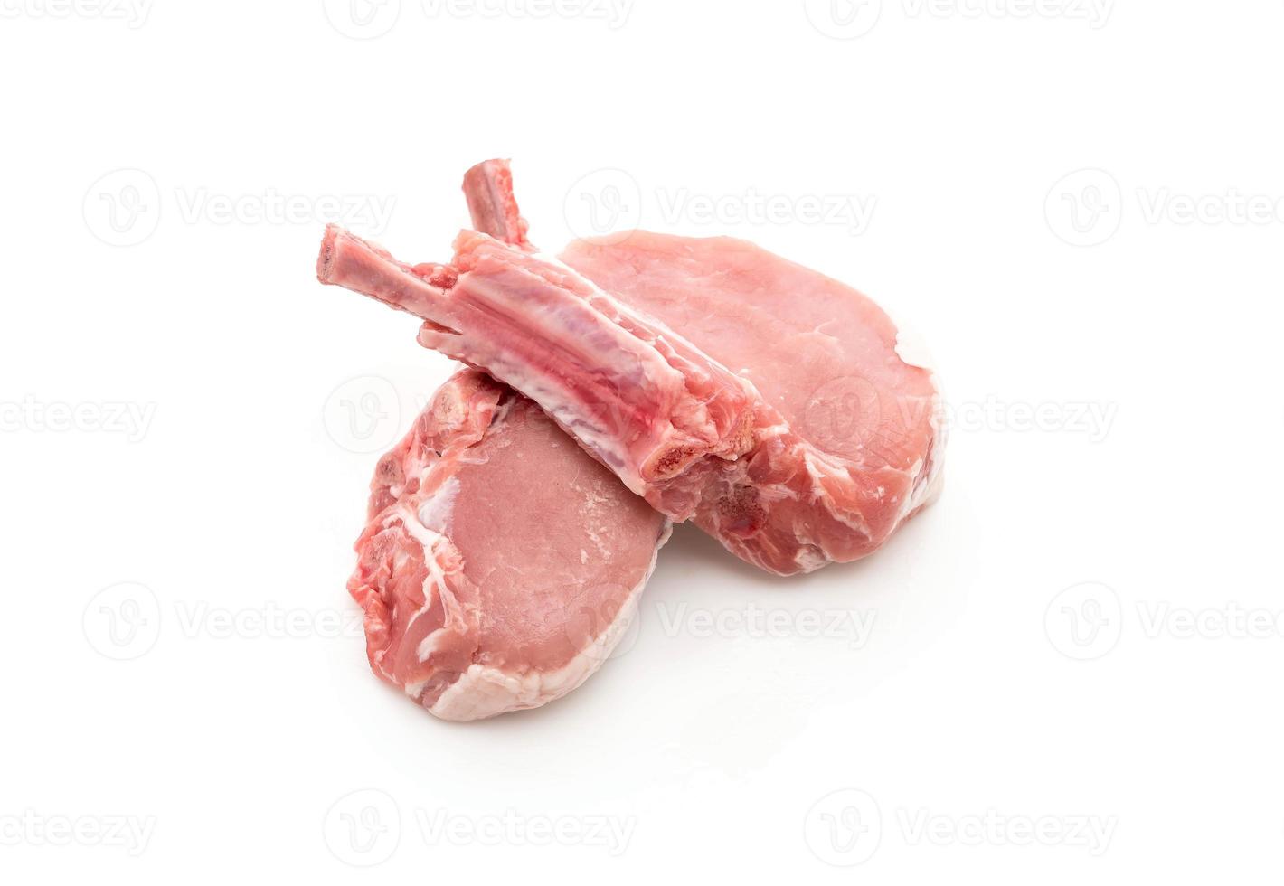 Fresh pork chop on white background photo