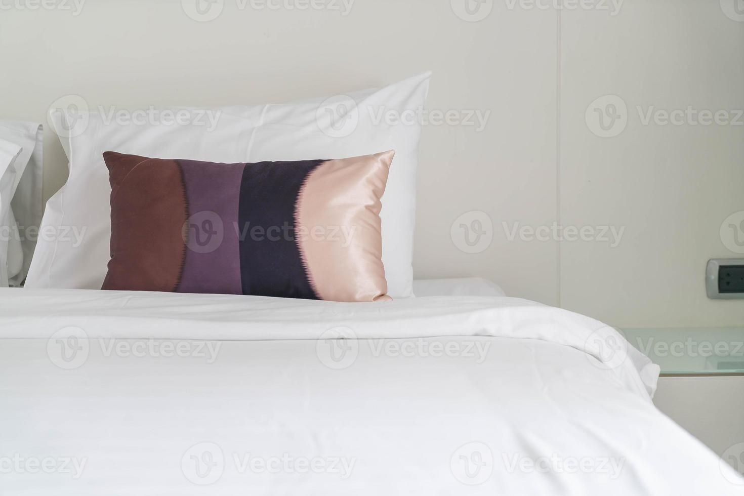 Pillow on bed decoration in bedroom interior photo