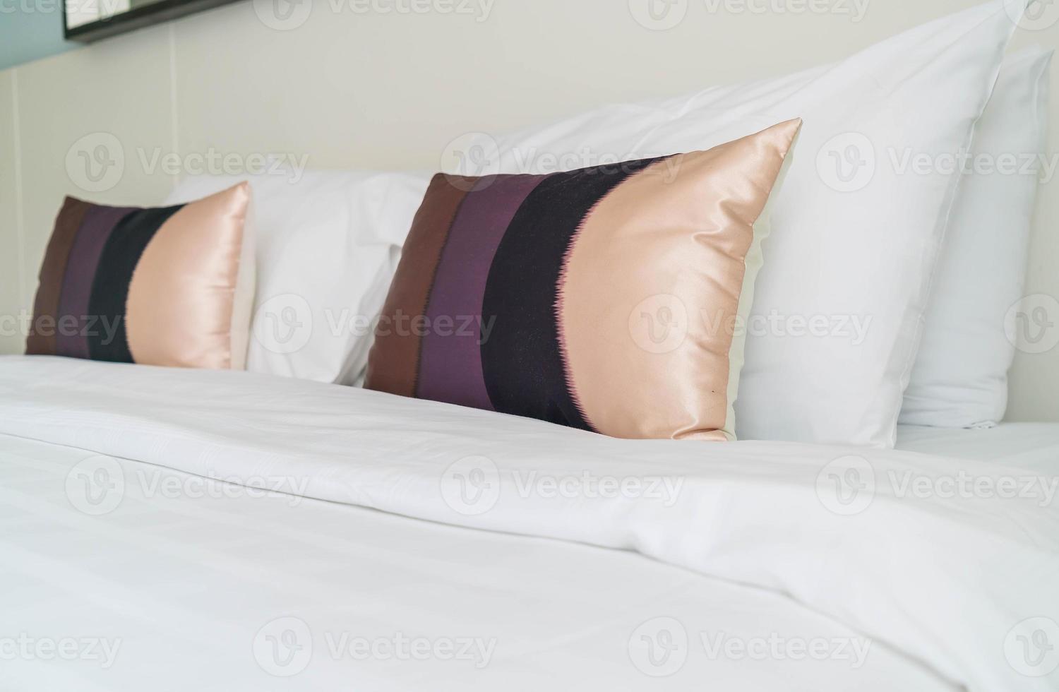 Pillow on bed decoration in bedroom interior photo