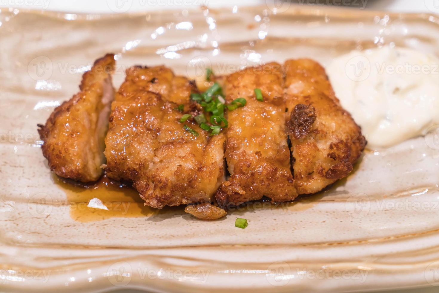 Fried chicken with teriyaki sauce - Japanese food photo