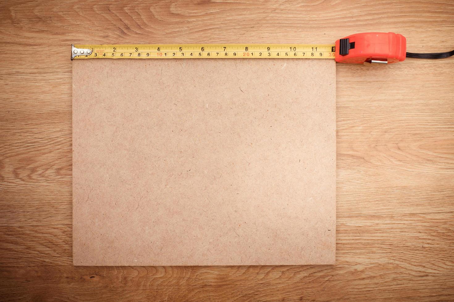 Working tools on wooden background. top view photo