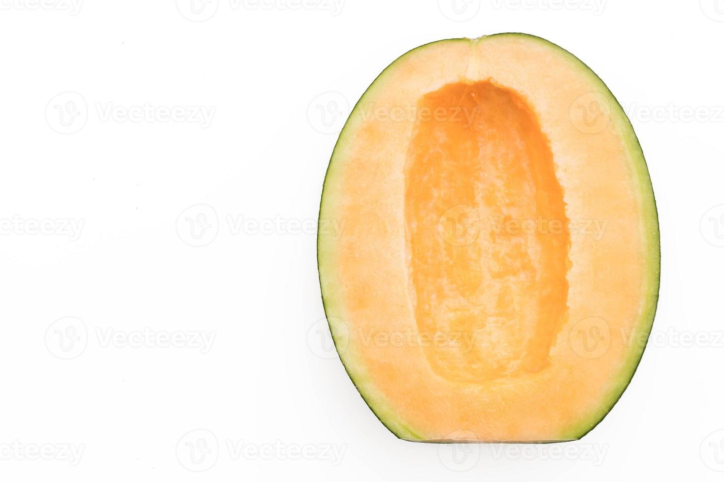 Melón cantalupo sobre fondo blanco. foto