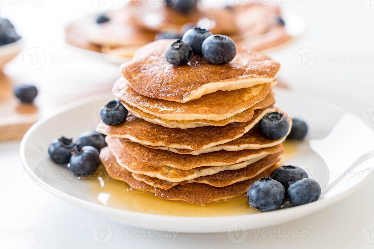 Stack of pancakes with fresh blueberry photo