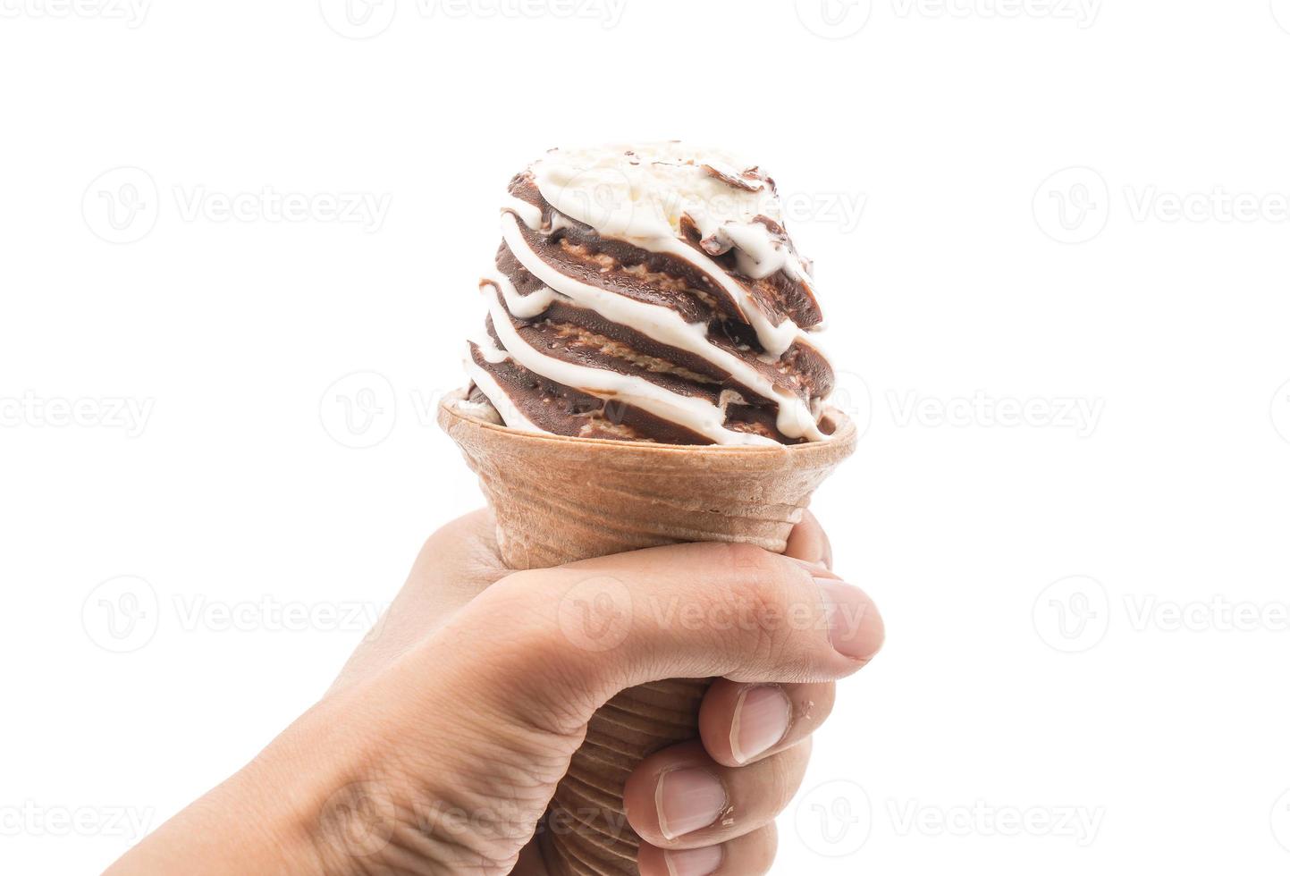 Chocolate ice cream cone on white background photo