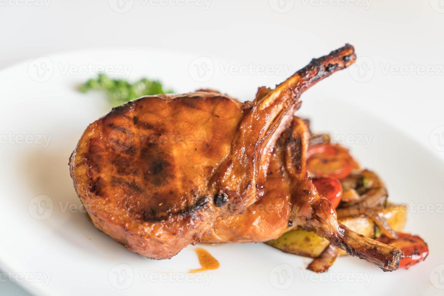 Pork chop steak on the table photo