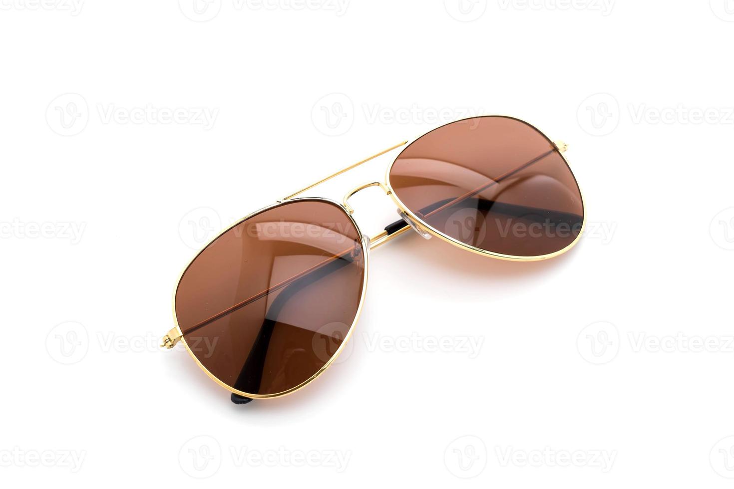 Beautiful sunglasses on white background photo