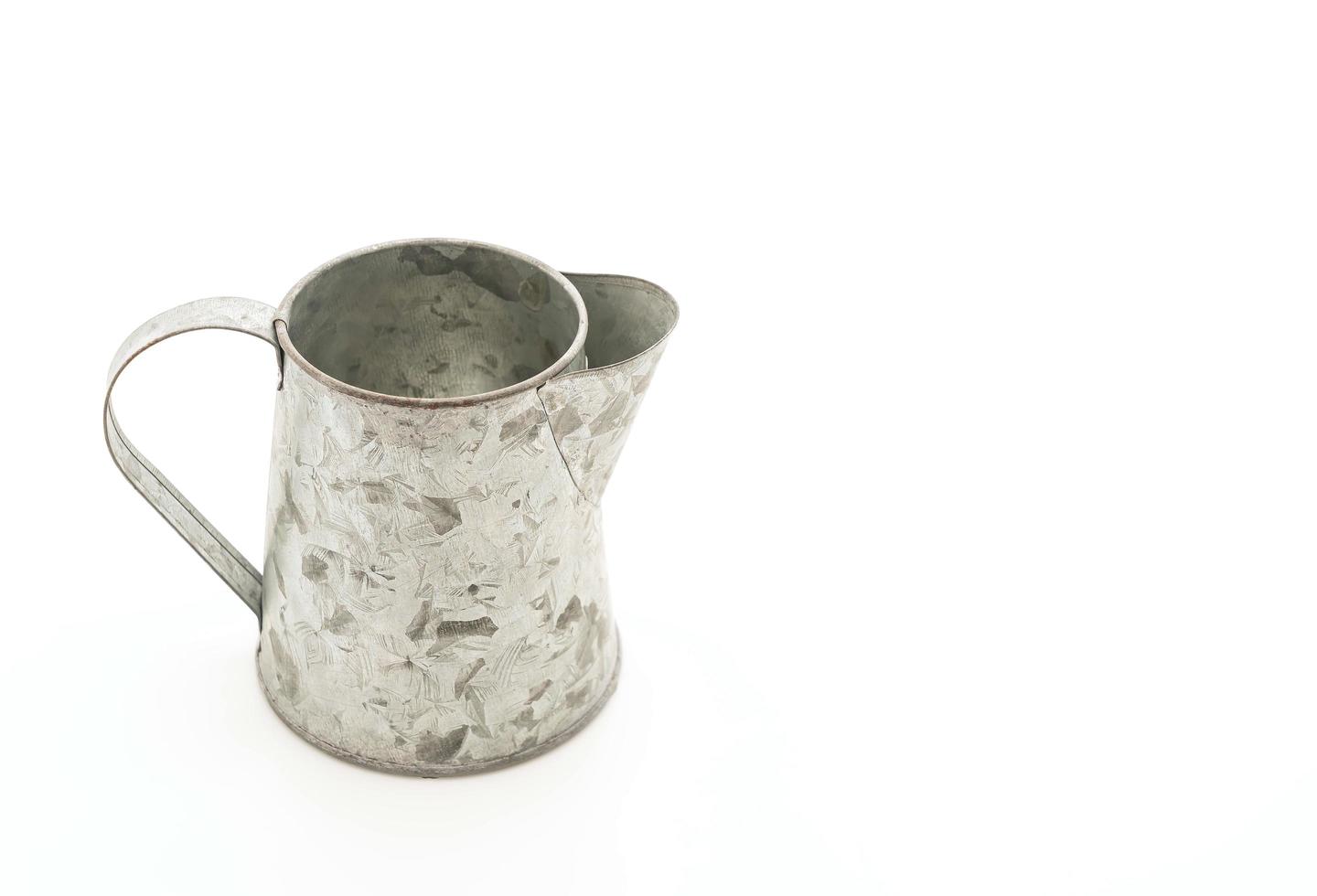 Iron jug on white background photo