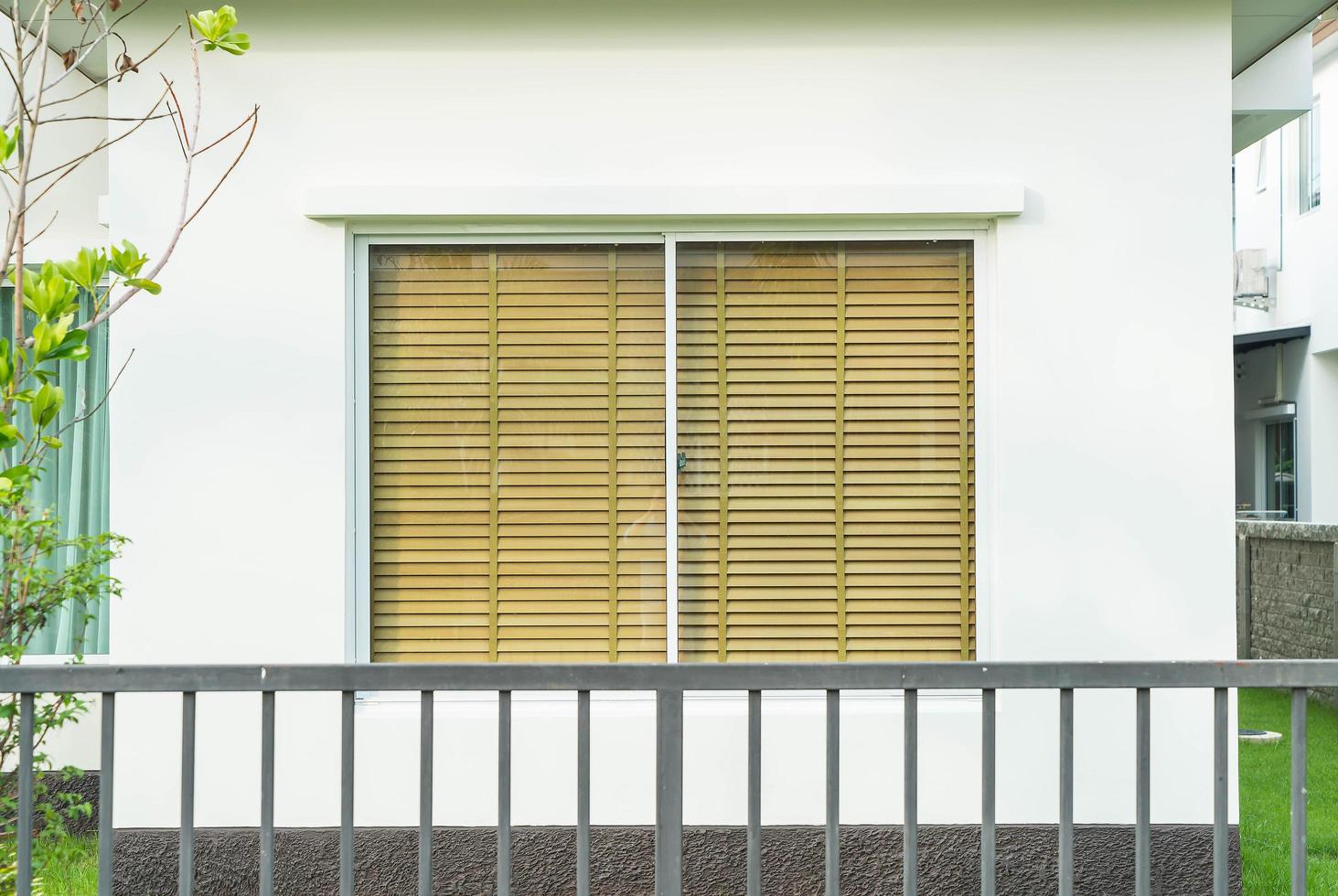 Empty glass door on outdoor side photo