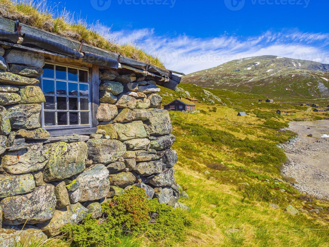 Vavatn lake panorama landscape huts snowy mountains Hemsedal Norway. photo