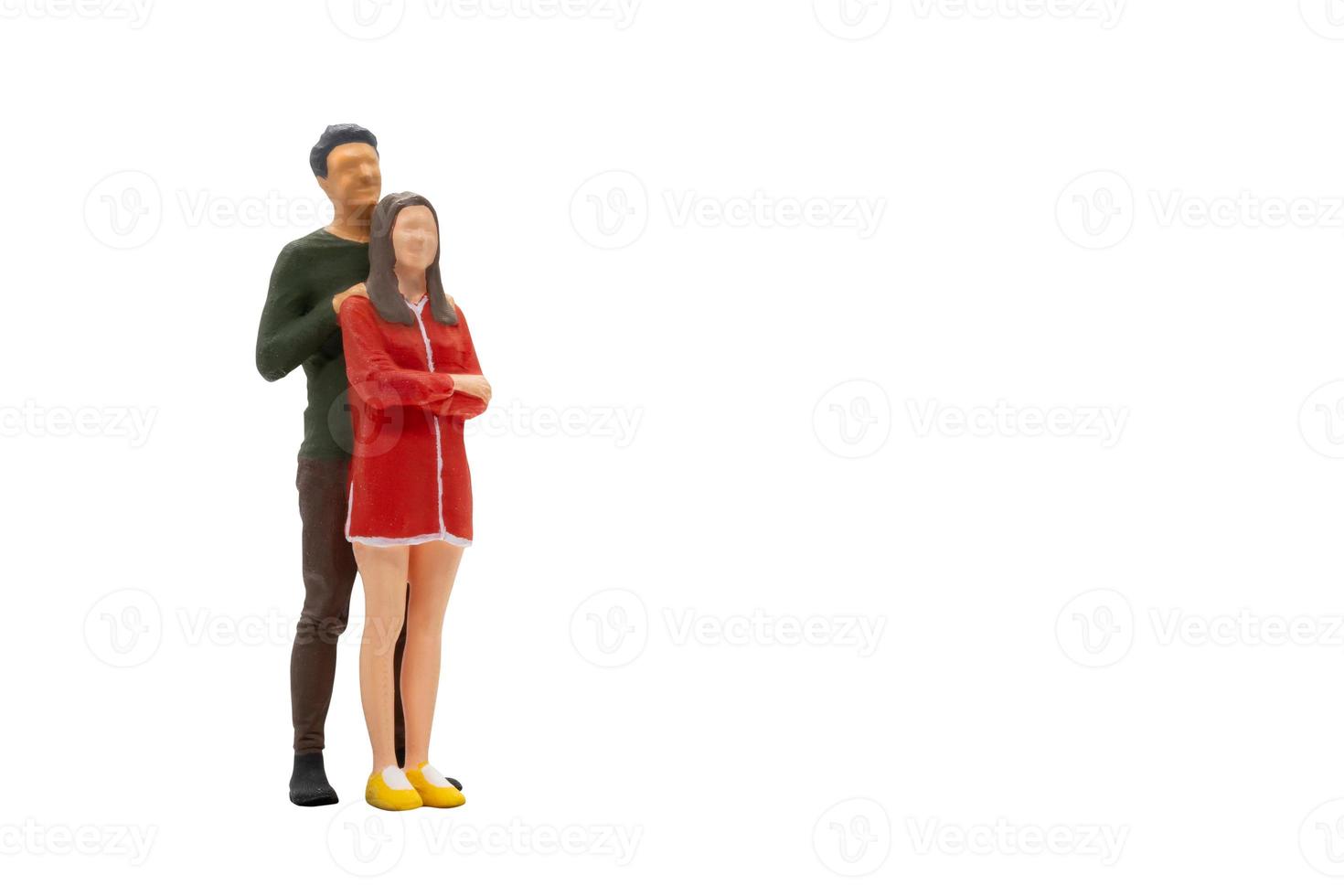 Miniature couple isolated on white background with clipping path photo