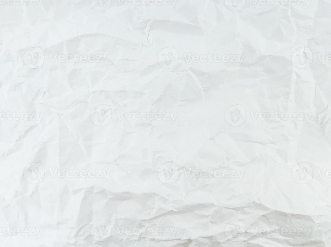 Textura de hoja de papel blanco arrugado con espacio vacío. foto