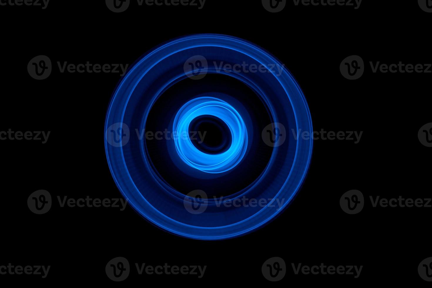 Glowing abstract curved blue lines photo