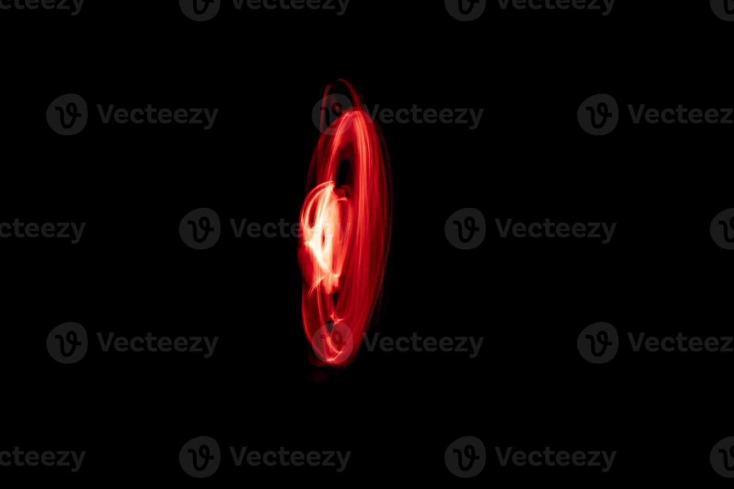 Glowing abstract curved red lines photo