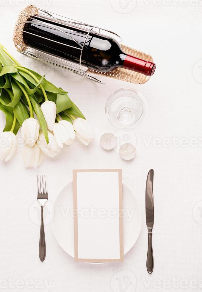 Mock up menu frame in restaurant or cafe. Top view of table setting photo