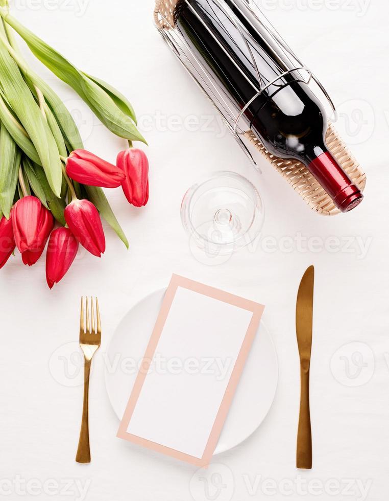 Mock up menu frame in restaurant or cafe . Top view of table setting photo