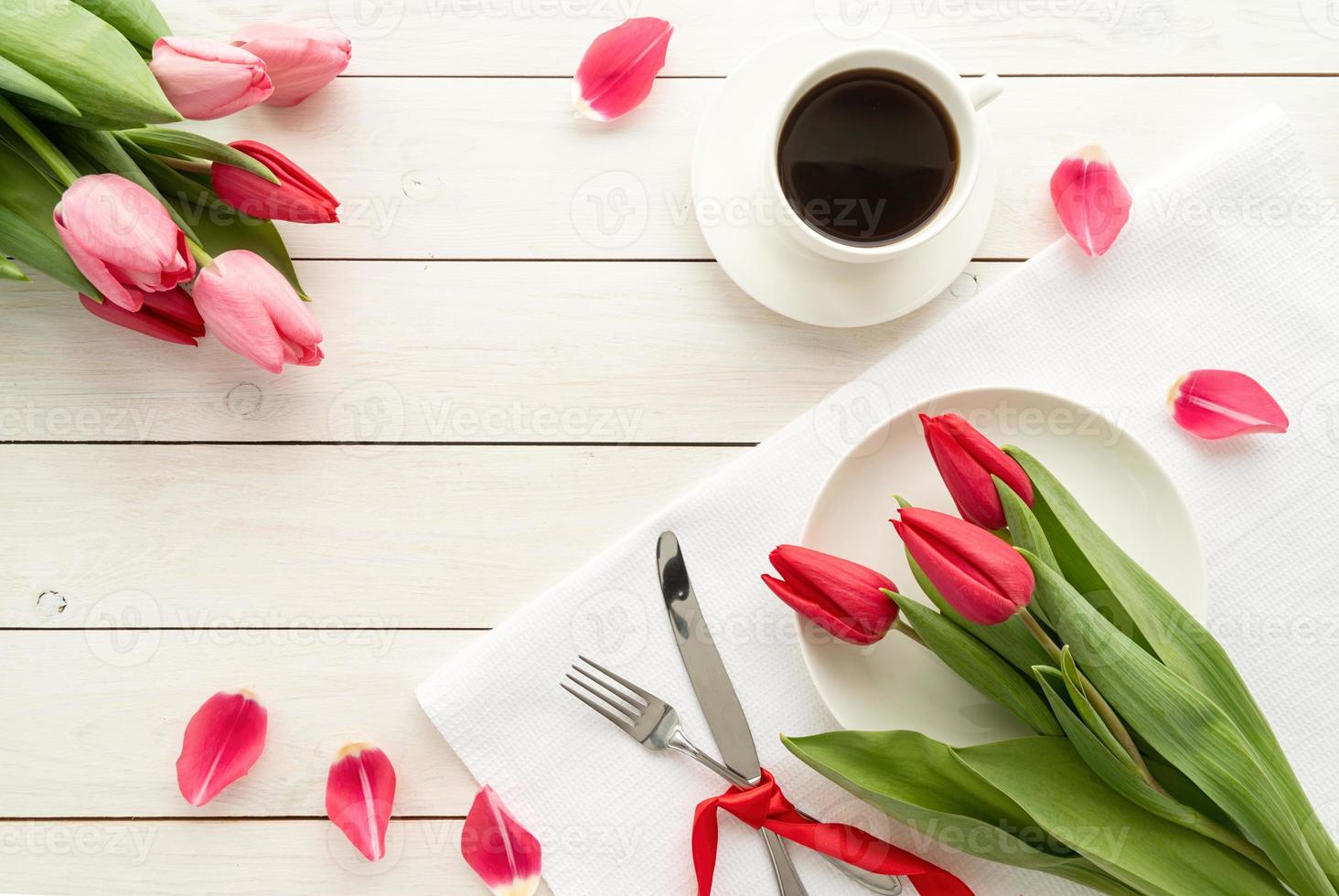 Elegant festive table setting with floral decor photo