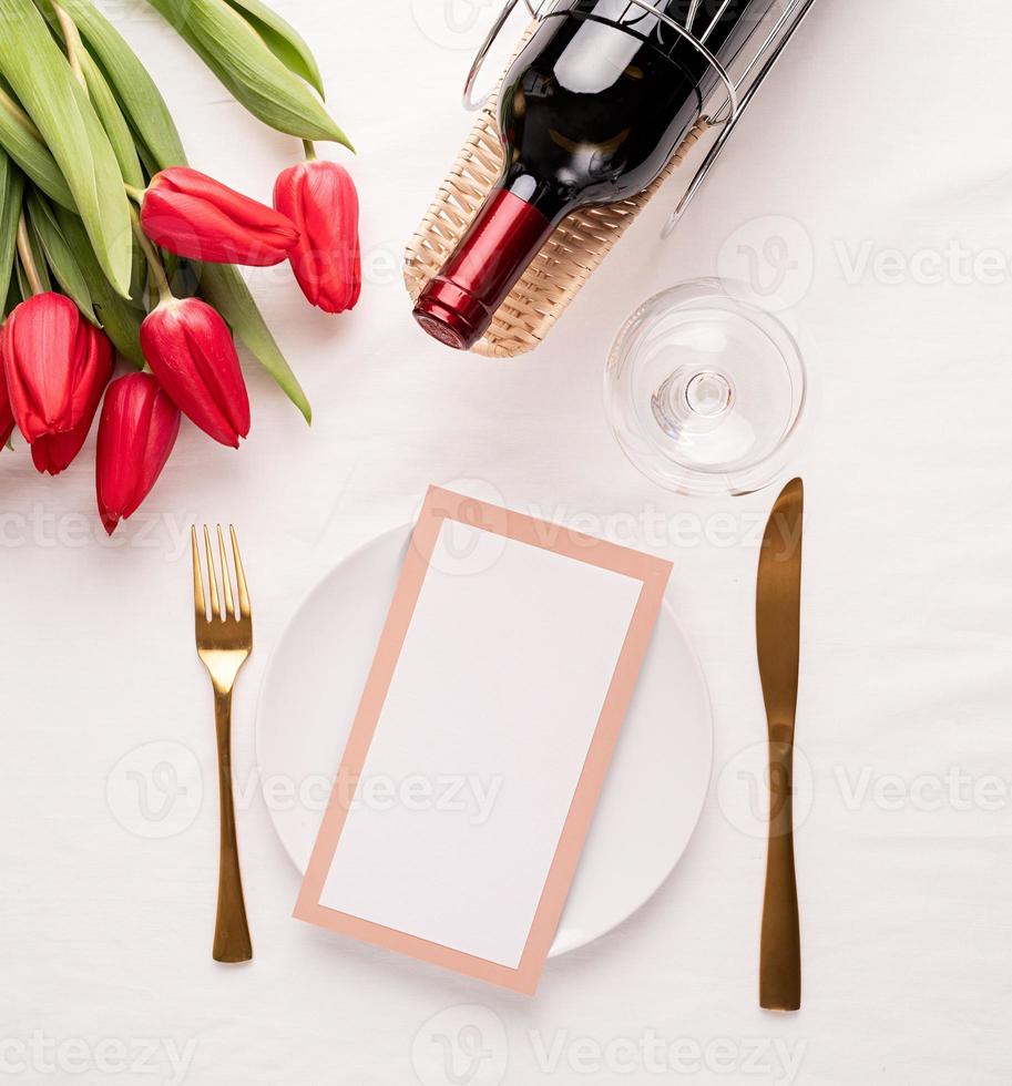Mock up menu frame in restaurant or cafe . Top view of table setting photo