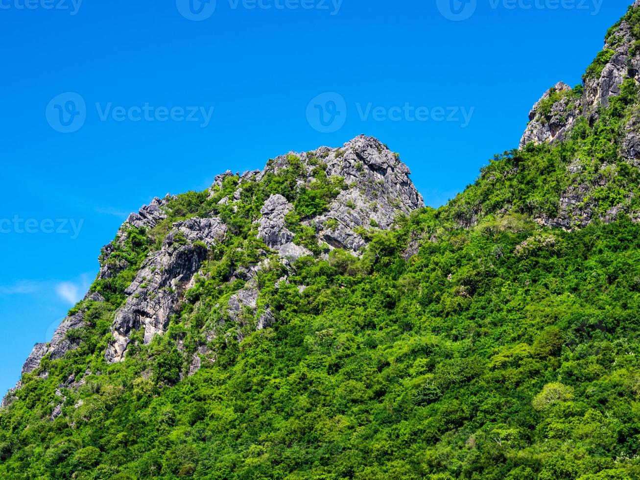 Rock mountain and the clear blue sky photo