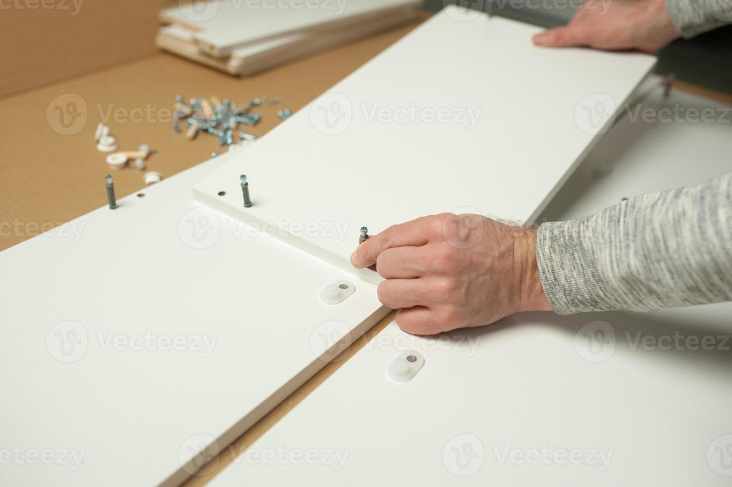 Master man install assembling furniture do it yourself. Home repairs photo