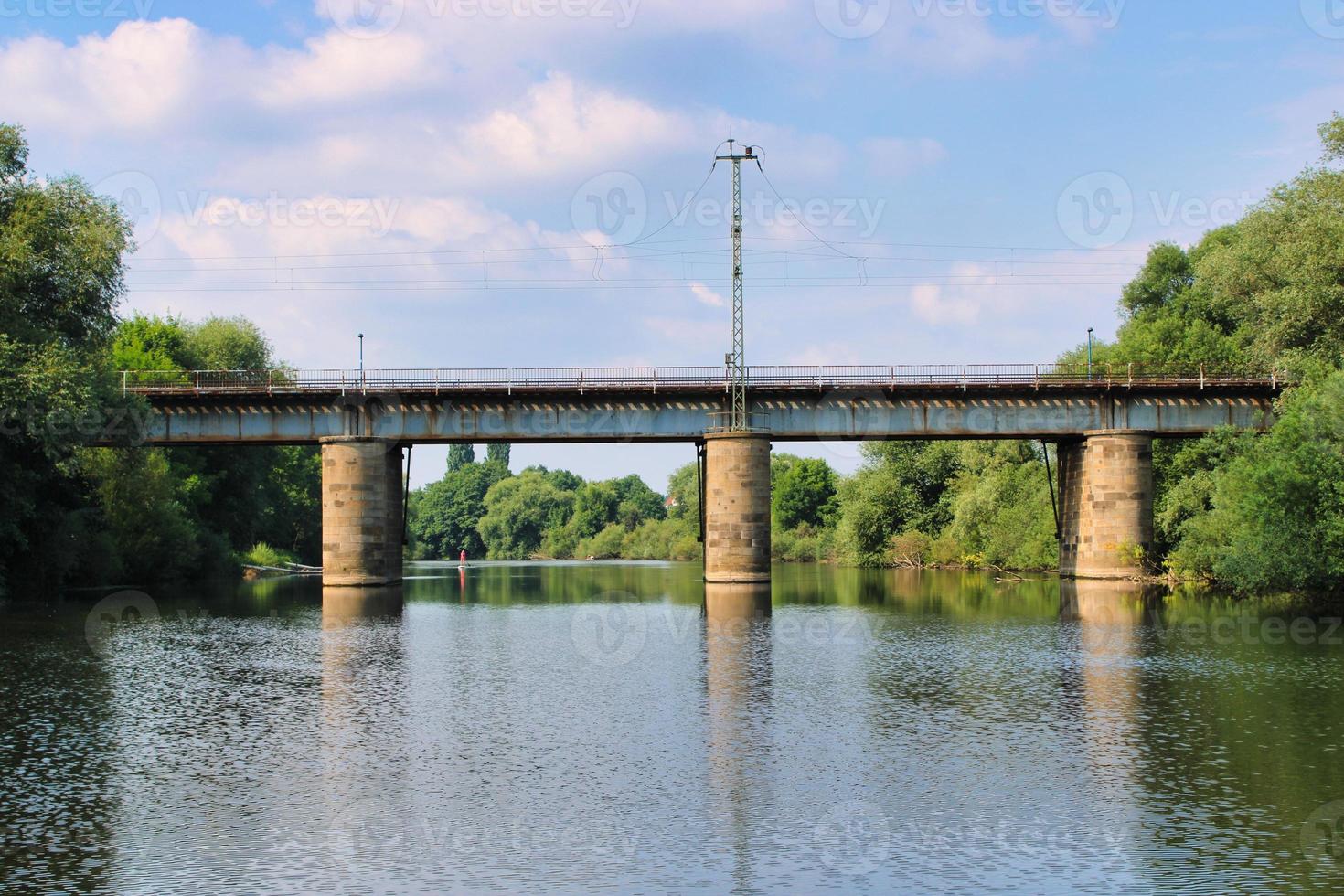 Bridge crossing Ems river close to the city of Rheine in Germany photo