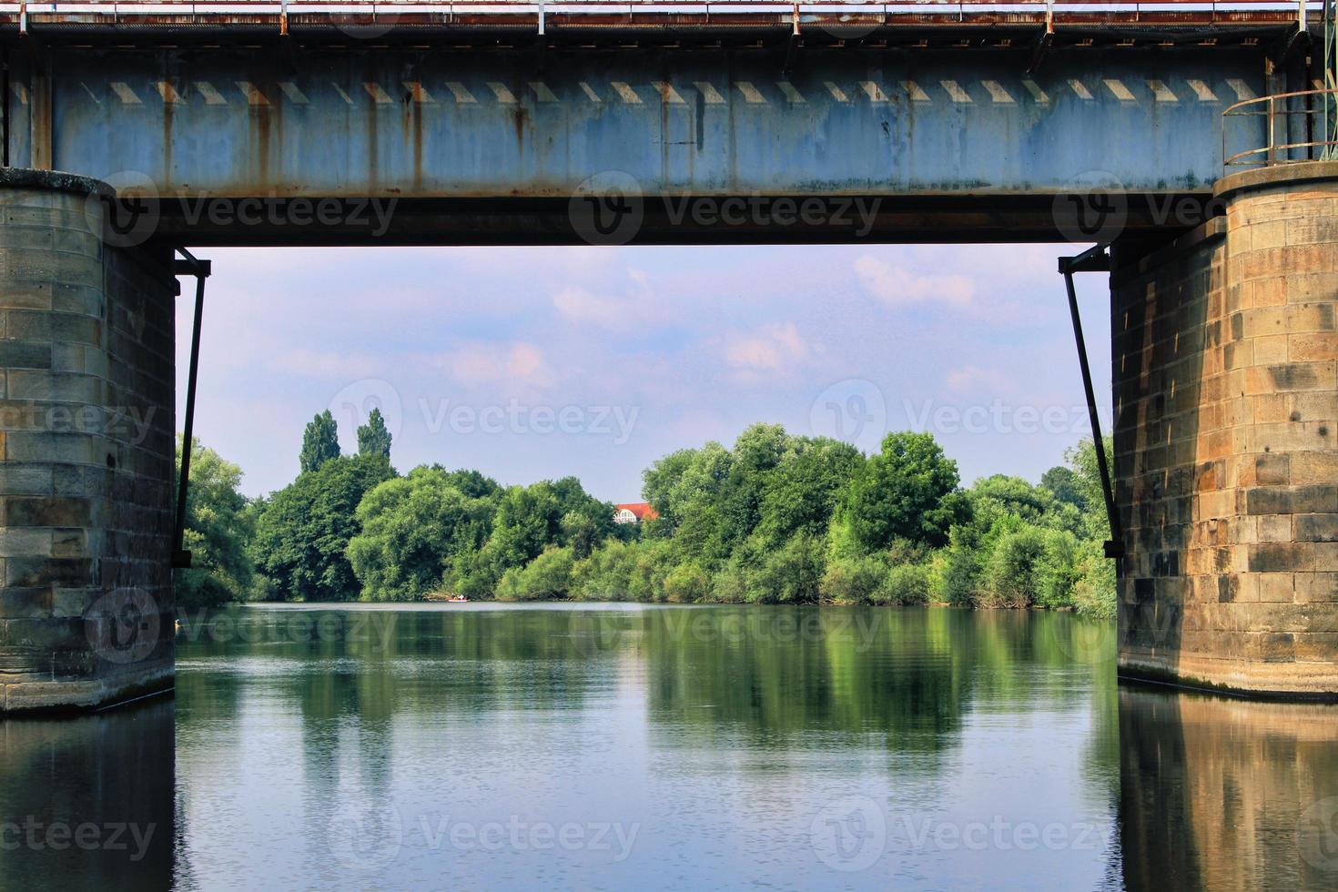 Bridge crossing Ems river close to the city of Rheine in Germany photo