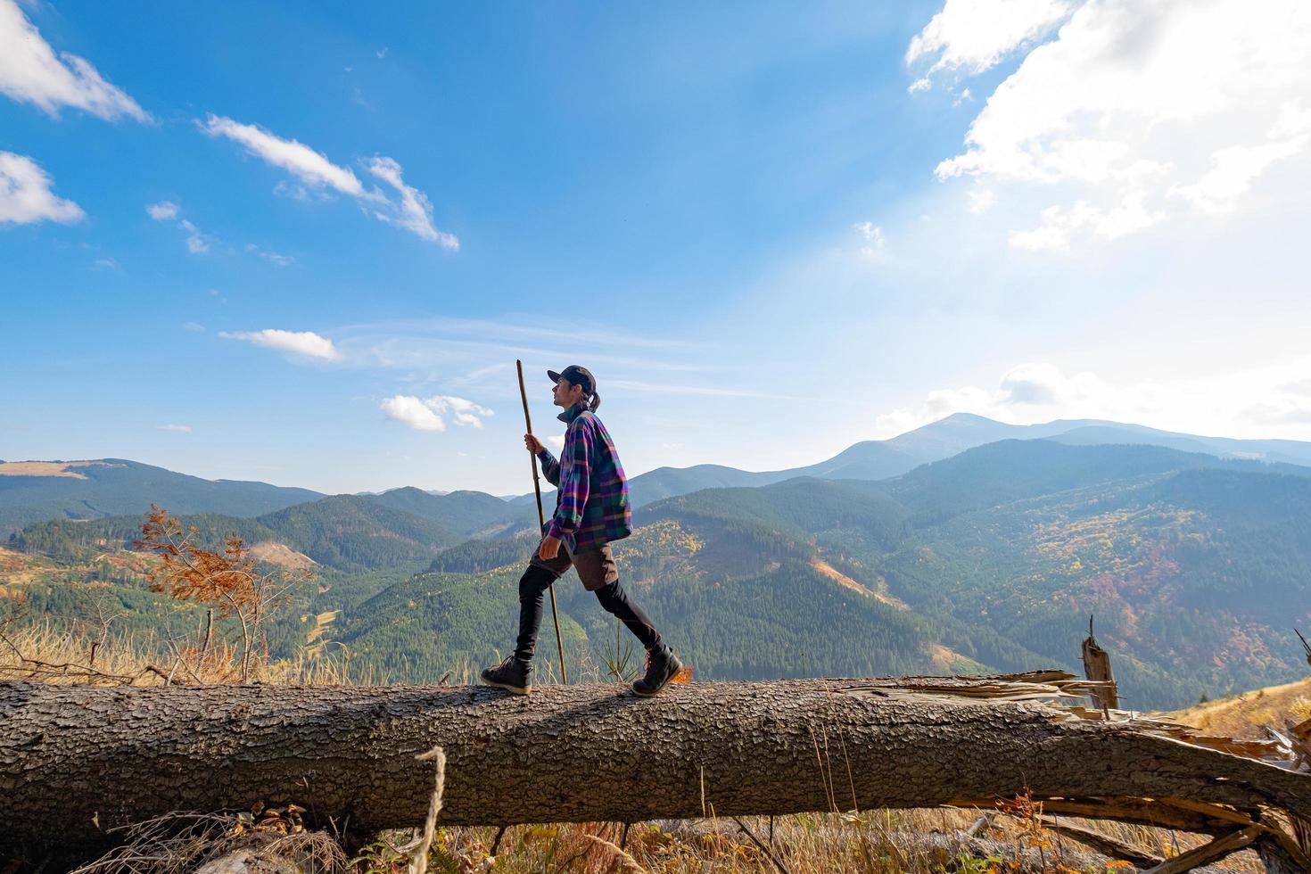 Young male traveler in the mountains photo