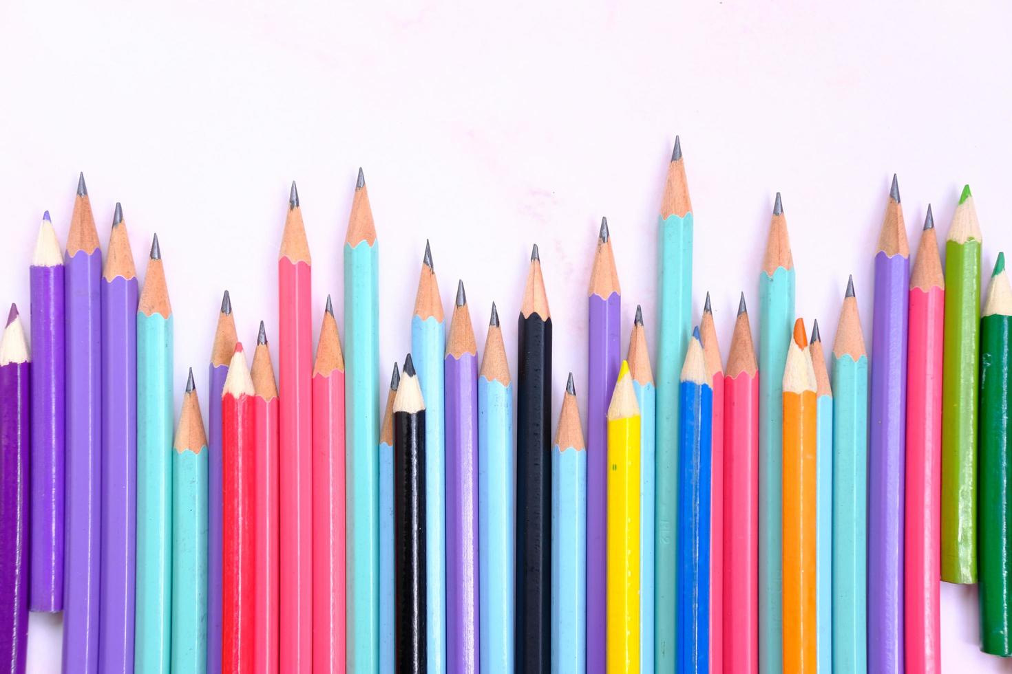 Pen and pencil, office equipment on table background photo