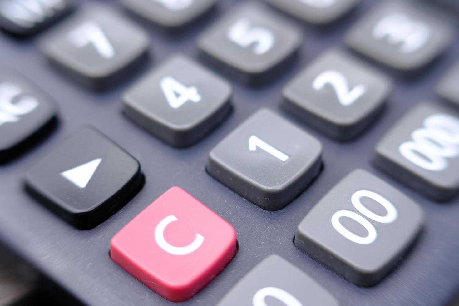 Close up calculator on wood table photo