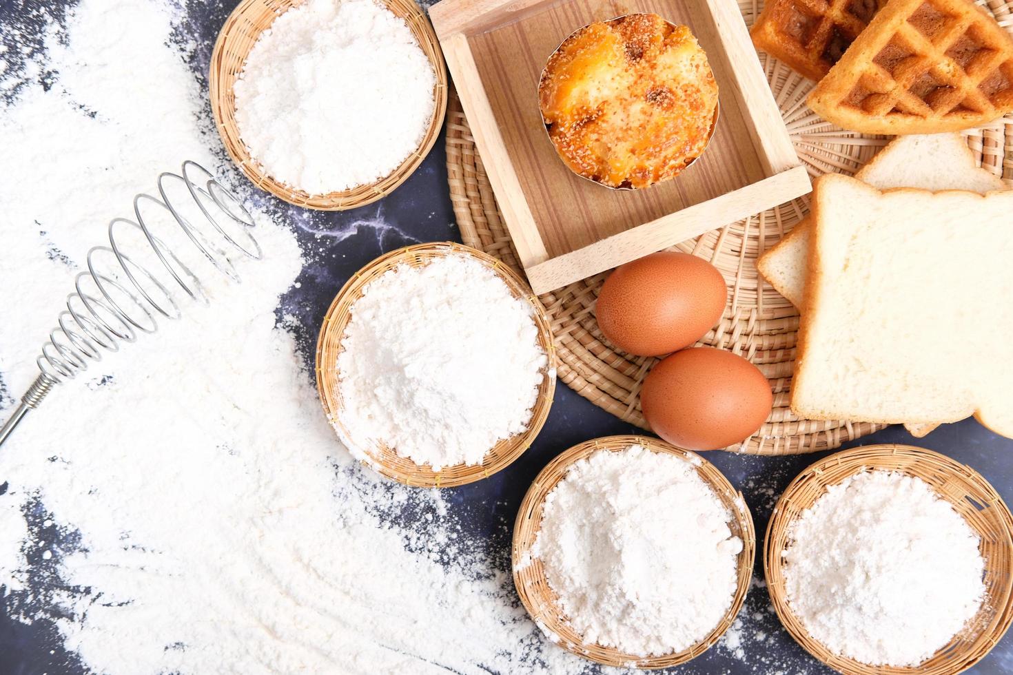 Flour and eggs for baking ingredients photo