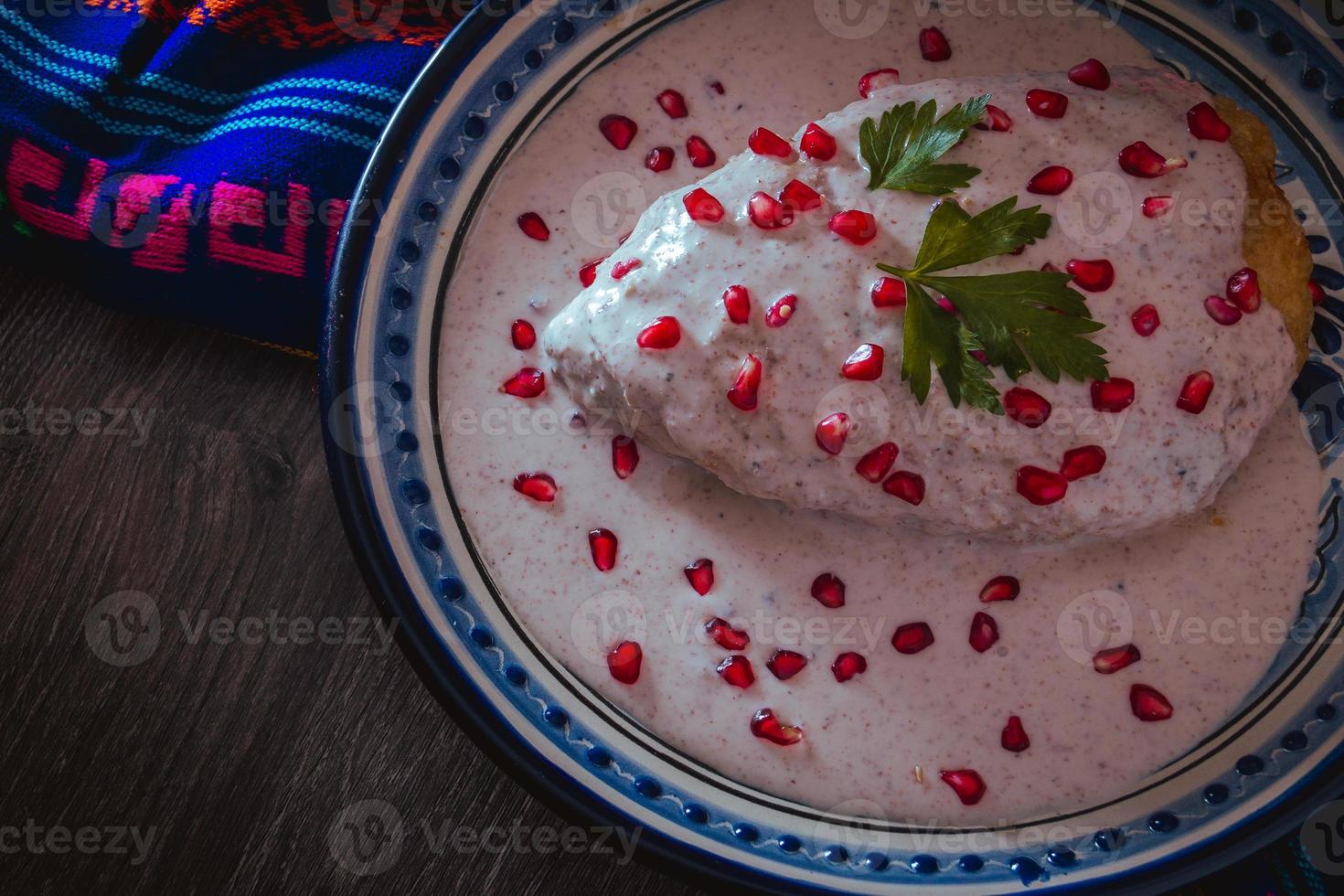 Chile en Nogada in a talavera plate from Puebla photo