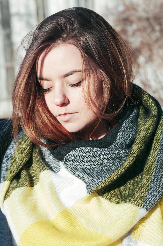 Street style portrait cute girl in bright yellow scarf photo