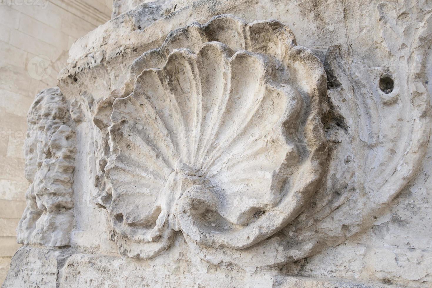 Element of the wall of an catholic Cathedral in the form of seashell photo