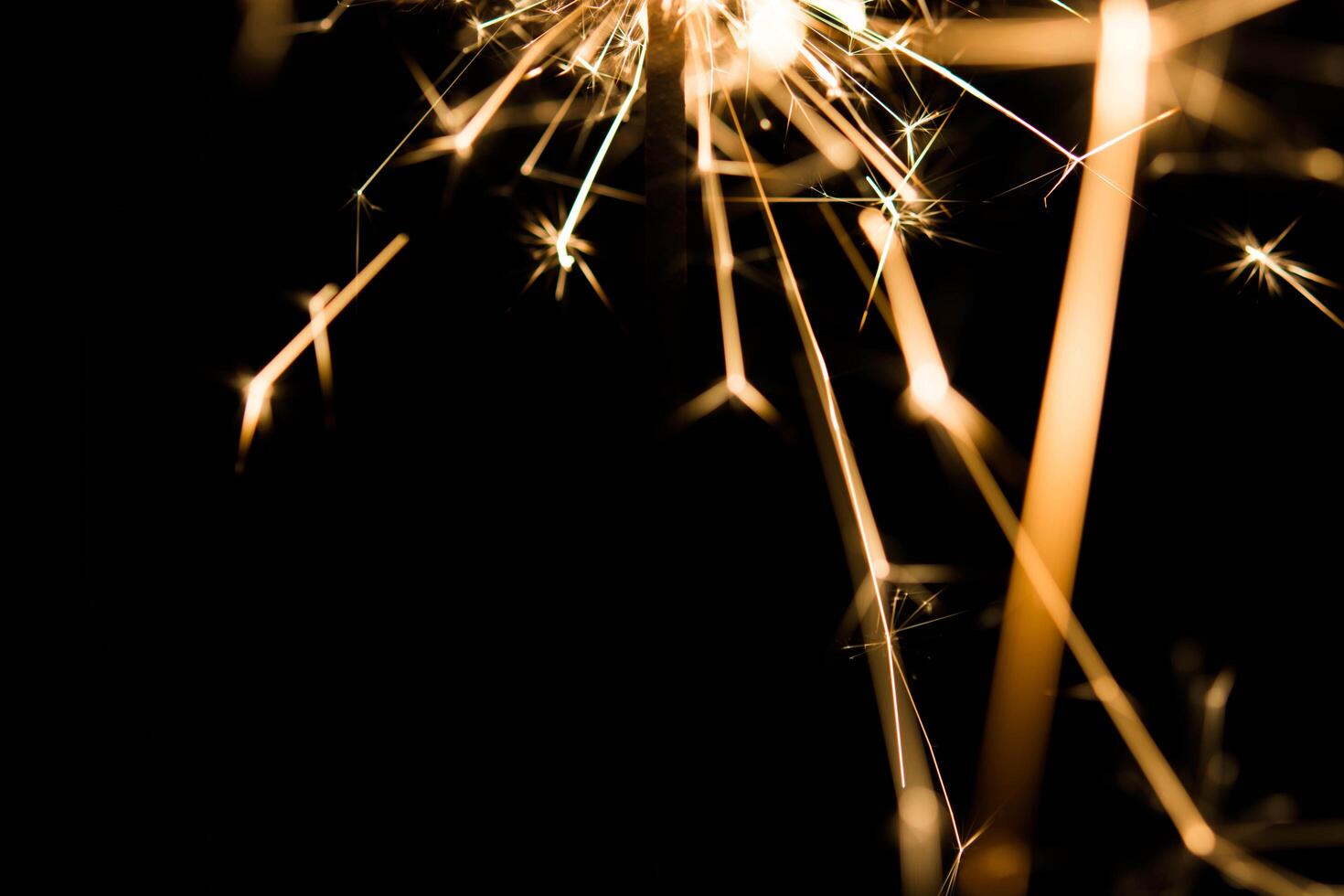 Christmas and newyear party sparkler on black photo