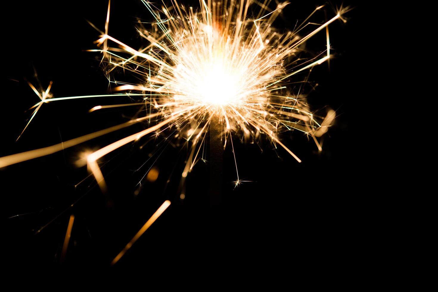 Christmas and newyear party sparkler on black photo