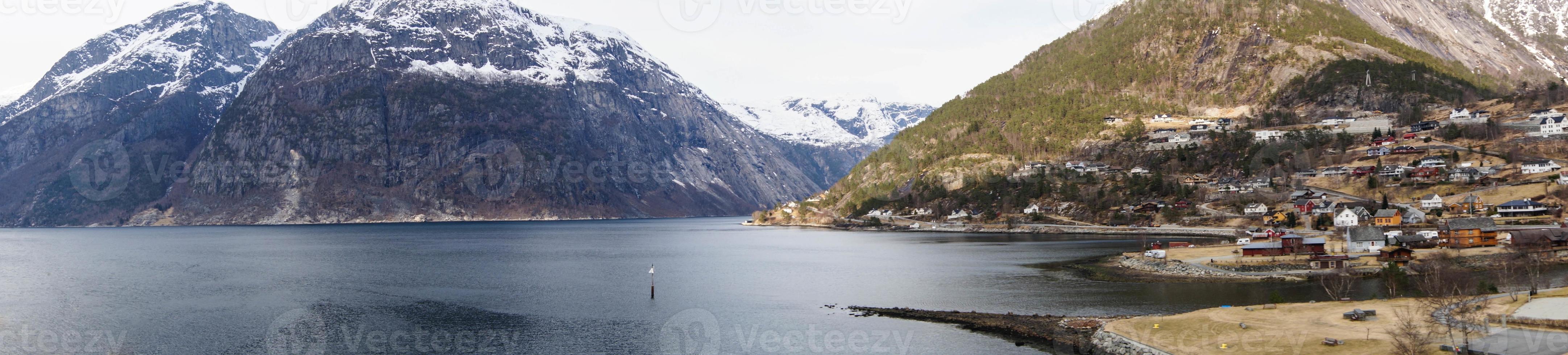 With a cruise ship in the fjords of norway photo
