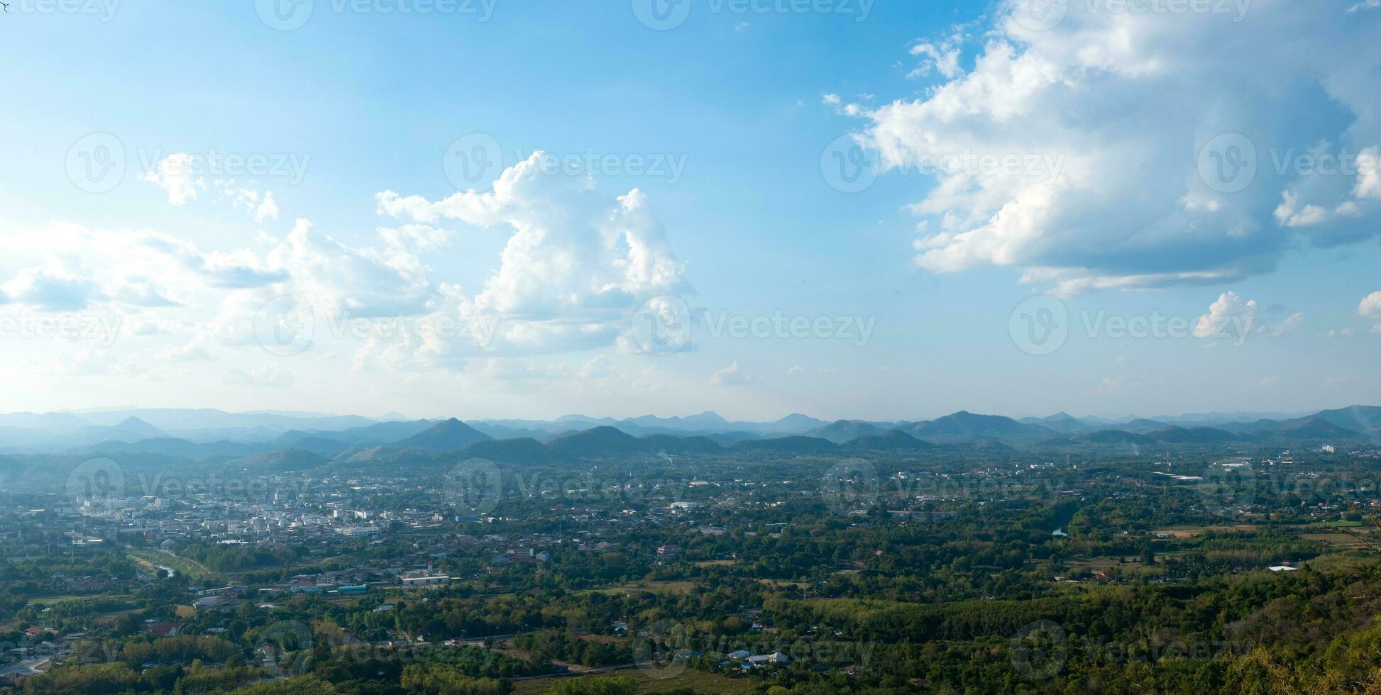 Beautiful sun sky cloud at the mountain range and the city photo