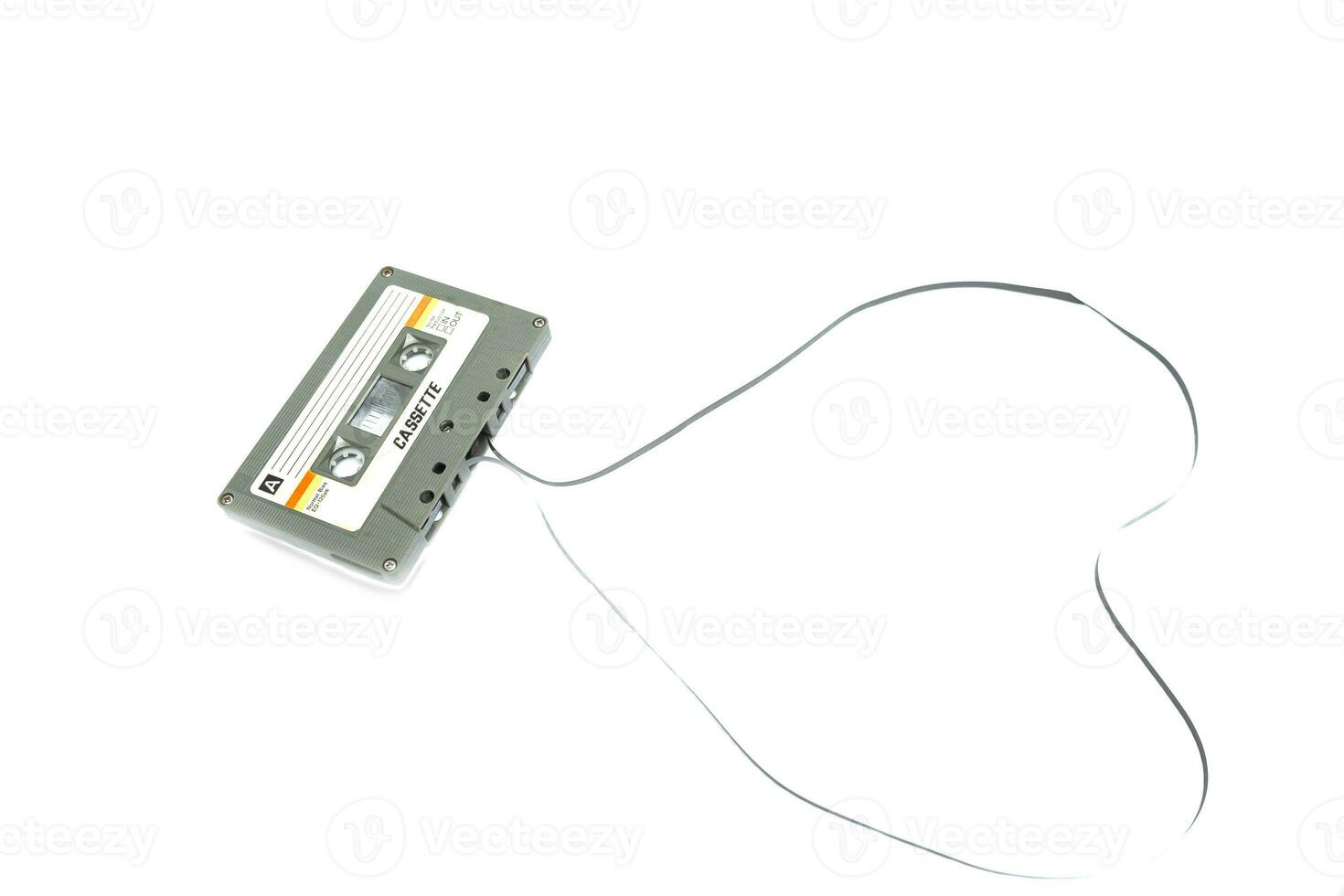 Vintage compact cassette tape on white background photo